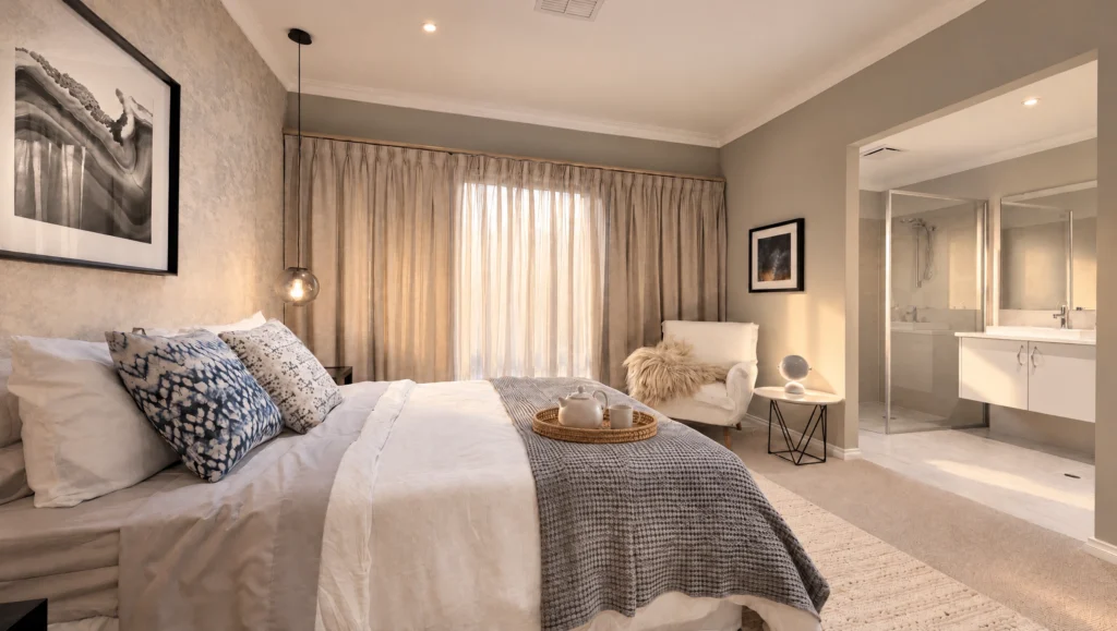 The Elephant Rocks bedroom features a king-size bed, armchair, and ensuite bathroom.