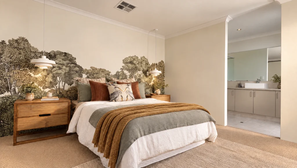The Massey Bay bedroom features a king-size bed with a forest mural wallpaper and an ensuite bathroom.